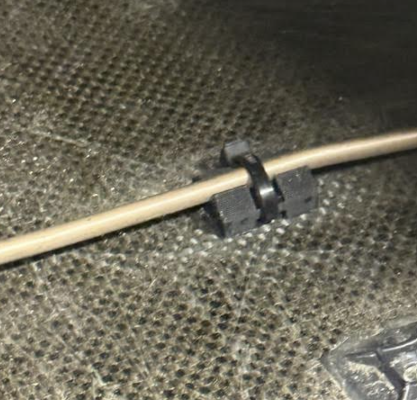 Brake line bracket installed on MR26